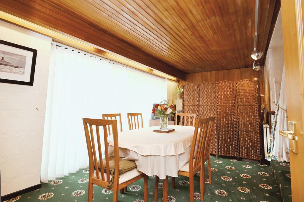The dining area, panelled and 17 feet 9 inches long