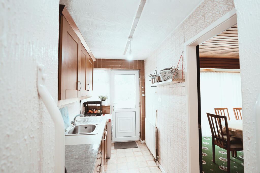 The utility, with the door out to the garden